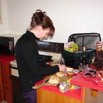 Gini preparing the days lunch. Satay Chicken + Chip Buttie. Yum.