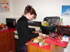 Gini preparing the days lunch. Satay Chicken + Chip Buttie. Yum.