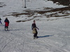 Gini showing off her newly learnt snowboarding skillz