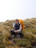 Tom catches his breath, while inspecting the strange flora underfoot