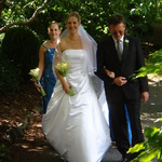 Walking down the Aisle - Nicky, held by her Dad, Len