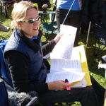 Nicky tries to take her mind off the race by doing some homework.