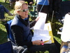 Nicky tries to take her mind off the race by doing some homework.