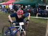 Tom arrives back from his Lap 2 ... Looking a little worse for wear.