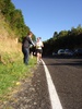Marcus hands his fiance fluids after she makes it up the hill