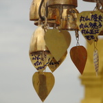 Messages left by visitors on tiny bells.