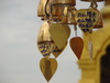 Messages left by visitors on tiny bells.