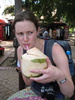 Gini slurps a coconut. Quite delicious!
