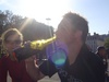 Tom enjoys a swig.