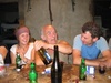 The Sheriff (middle) shows Kristin and Andre how to pour the wine on the first night.