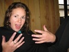 Gini with purple fingers after a day of picking grapes.