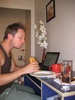 Tom eating on the job.  Mmmm, baguette.