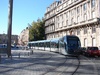 Tram and cars