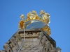 Virgin Mary in gold at the top