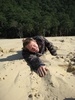 Tom attempting to climb back up