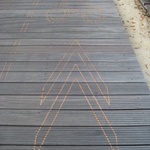 Bike signs engraved into the board walks