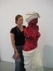 This poor women was coated with fake red fingernails.