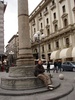 Tom sits on the only Roman pillar left standing from the Roman Forum