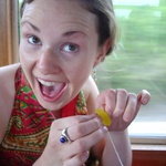 Happy in her work, making a lolly necklace for leece