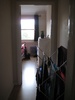 The entrance and laundry to our room