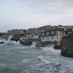 The waves were battling the houses!