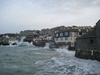 The waves were battling the houses!
