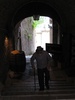 Classic shot of an old guy climbing the alley way