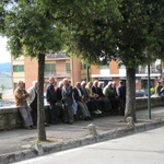 A congregation of grey hairs enjoying the sun.