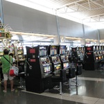 Slot machines in the baggage claim area - what is this place??
