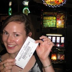 Gini shows off her winnings on the Irish Jigg slot machine.