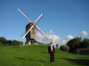 Gini with the huge windmill hill behind her.