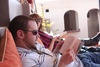 Relaxing in the sun with a book