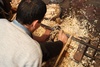 Just amazing skill with his feet! Everything he does by hand and feet!