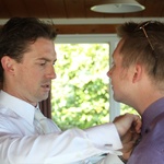 James helps with Tom's tie on the big day!