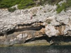 Tom, climbing the cliff of death.