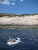 Josh and Marcus row in circles on their way to the blue cave.