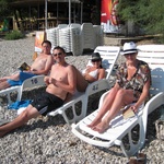 Lounging on one of the many pebbly beaches.