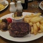 Well worth the wait - a massive Angus Fillet steak with large chips and a haggis sauce.