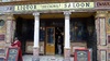 Oldest & prettiest Saloon bar with Italian tiles, metal roof & wooden booths with doors!