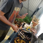Roman, Tom's Deleter helping with BBQ, 2010