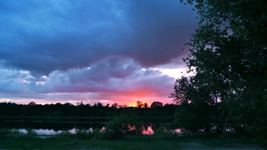 The beautiful sunset view from our riverside camp spot