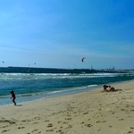 The sky was littered with kite surfers.