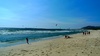 The sky was littered with kite surfers.
