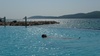 Gini in a salt pool by the sea