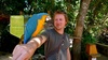 Tom get's to hold a parakeet 