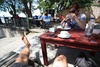 Enjoying tea by the water in a lovely cafe