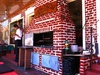 Parrilla Steak House with the BBQ out on the side walk.