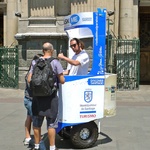 An information guy on a segway ... I wonder if he know how ridiculous he looked?