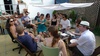 Enjoying the hot sun and tasty food at our Leaving London BBQ.