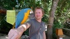 Tom makes a new heavy scratchy colourful friend at Parque das Aves near Foz do Iguacu, Brazil.